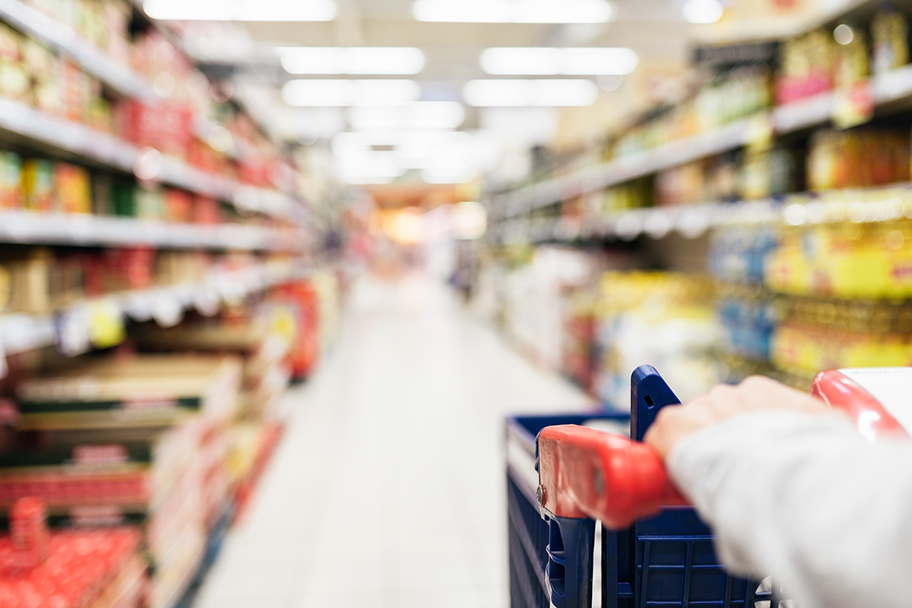 Close-up-of-woman-using-shopping-cart-in-supermarket at Crescent Pointe located in the foothills of South Carolina